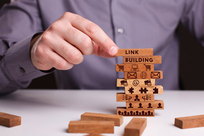Link building is otherwise known as back linking, which is actively requesting links from business peers